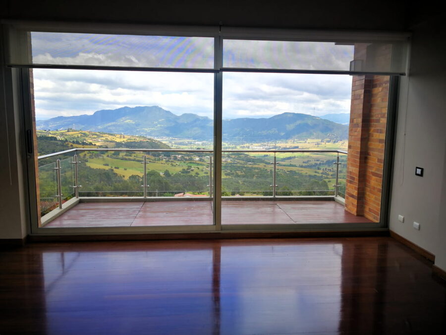 Casa Horizonte Reservado habitación principal con balcón y hermosa vista